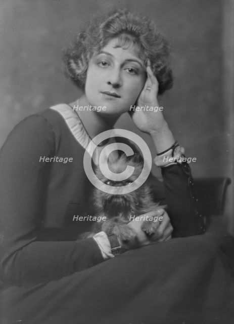Melville, Mrs., with dog, portrait photograph, not before 1916. Creator: Arnold Genthe.