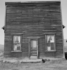 Member of Ola self help sawmill co-op..., "Jacknife Saloon", Gem County, Idaho, 1939. Creator: Dorothea Lange