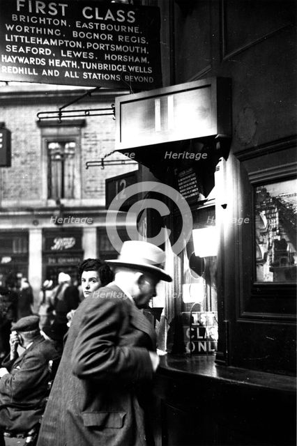 Member of Locomotive Spotters at Victoria Station, 1950. Creator: Henry Grant.