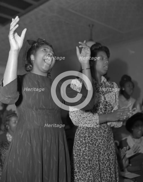 Members of the congregation of the Church of God in Christ, Washington, D.C., 1942. Creator: Gordon Parks.