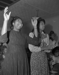 Members of the congregation of the Church of God in Christ, Washington, D.C., 1942. Creator: Gordon Parks