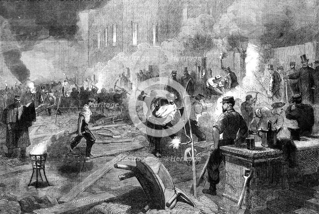 Members of the South Middlesex Rifle Volunteer Corps at work by torchlight in the gardens..., 1862. Creator: Unknown.