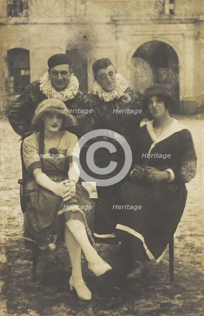Members of 'The Stars' concert party, two soldiers in drag and two as pierrots, pose around..., 1919 Creator: Unknown.