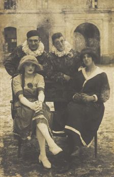 Members of The Stars concert party, two soldiers in drag and two as pierrots, pose around..., 1919 Creator: Unknown