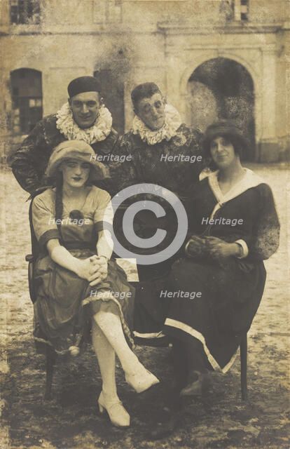 Members of 'The Stars' concert party, two soldiers in drag and two as pierrots, pose around..., 1919 Creator: Unknown.