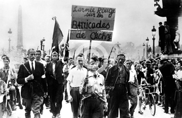 Members of the Resistance marching on the Place de la Concorde, liberation of Paris, August 1944. Artist: Unknown