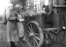 Members of the Womens's Army Auxiliary Corps cooking at a field kitchen, Sweden, 1933. Creator: Unknown