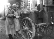 Members of the Womens's Army Auxiliary Corps cooking at a field kitchen, Sweden, 1933