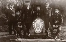 Members of the winning Rowntree Ambulance Team pose with trophy, York, Yorkshire, 24 Jan 1914