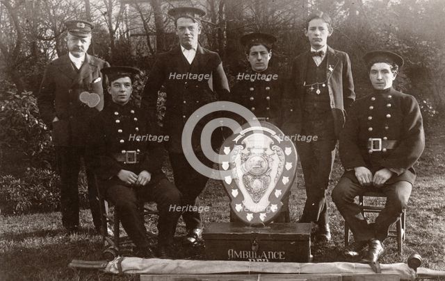 Members of the winning Rowntree Ambulance Team pose with trophy, York, Yorkshire, 24 Jan 1914. Artist: Unknown