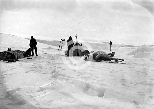 Members of a Sled Expedition near Their Tent, 1913. Creator: Mikhail Alekseevich Pavlov.