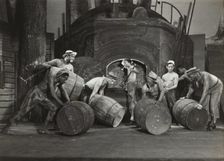 Men moving barrels, 1936. Creator: Milton Meltzer