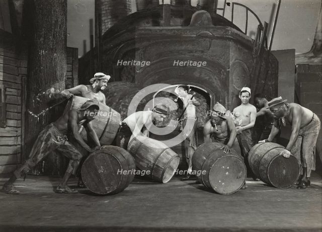 Men moving barrels, 1936. Creator: Milton Meltzer.