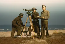 Men of Fort Story operate an azimuth instrument, to measure the angle..., Fort Story, Va., 1942. Creator: Alfred T Palmer