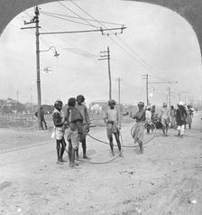Men about to draw a heavy load, Rangoon, Burma, 1908. Artist: Stereo Travel Co