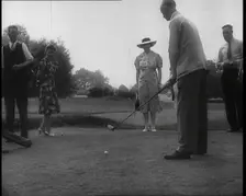 Men and Women at the Golf Links With One Man Lining up His Shot, 1939. Creator: British Pathe Ltd