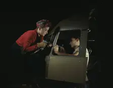 Men and women make efficient operating teams...Douglas Aircraft plant, Long Beach, Calif. , 1942. Creator: Alfred T Palmer