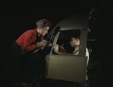 Men and women make efficient operating teams...Douglas Aircraft plant, Long Beach, Calif. , 1942. Creator: Alfred T Palmer