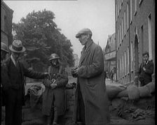 Men Being Stopped and Searched at a Roadblock in Ireland, United Kingdom, 1920. Creator: British Pathe Ltd