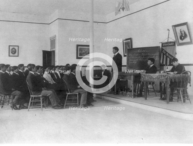 Men debating in class, Carlisle Indian School, Carlisle, Pennsylvania, 1901. Creator: Frances Benjamin Johnston.