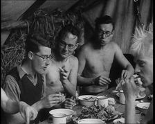 Men Eating Under a Canopy, 1933. Creator: British Pathe Ltd