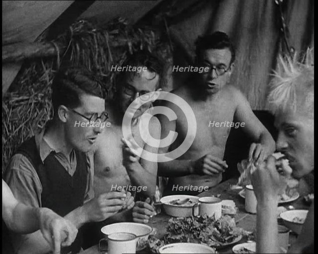 Men Eating Under a Canopy, 1933. Creator: British Pathe Ltd.