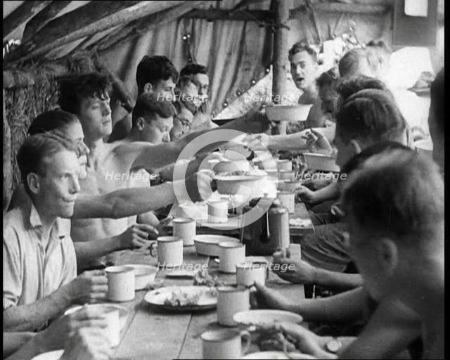 Men Eating Under a Canopy, 1933. Creator: British Pathe Ltd.