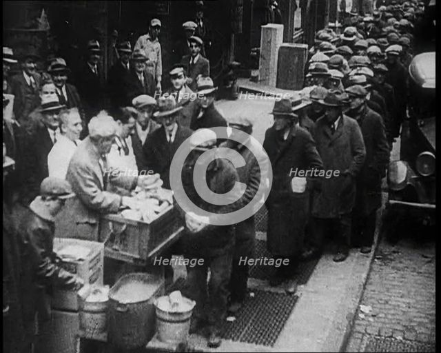 Men Getting Soup from a Soup Kitchen, 1933. Creator: British Pathe Ltd.