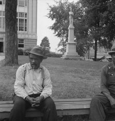 Men idling around the courthouse square, Roxboro, North Carolina, 1939. Creator: Dorothea Lange