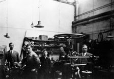 Men in a printing workshop, (late 19th-early 20th century?). Creator: W Martin