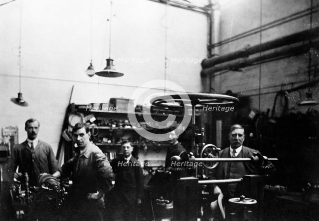 Men in a printing workshop, (late 19th-early 20th century?). Creator: W Martin.
