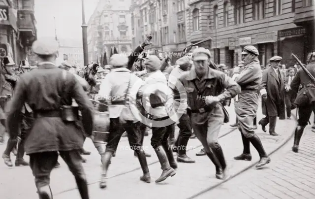 Men in Bolshevik uniform fighting police in the street, Germany, c1918-c1933(?) (1936). Creator: Unknown.
