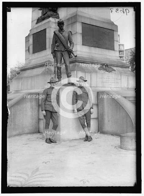 Men in uniform at Sherman Monument, Washington, D.C., between 1916 and 1918. Creator: Harris & Ewing.