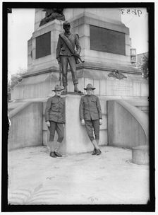 Men in uniform at Sherman Monument, Washington, D.C., between 1916 and 1918. Creator: Harris & Ewing
