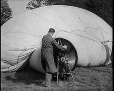 Men Inflating a Hot Air Balloon, 1936. Creator: British Pathe Ltd