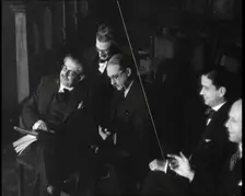 Men Listening to Beniamino Gigli Singing Largo by Handel, 1930s. Creator: British Pathe Ltd