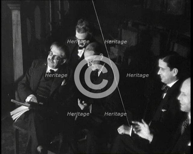 Men Listening to Beniamino Gigli Singing 'Largo' by Handel, 1930s. Creator: British Pathe Ltd.