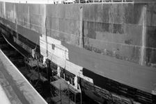 Men painting at Tilbury, Essex, c1945-c1965. Artist: SW Rawlings