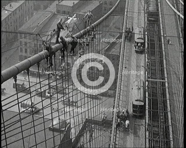 Men Painting the Brooklyn Bridge in New York City, 1922. Creator: British Pathe Ltd.