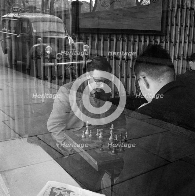 Men playing chess in a cafe, Hampstead, London, 1962-1964. Artist: John Gay