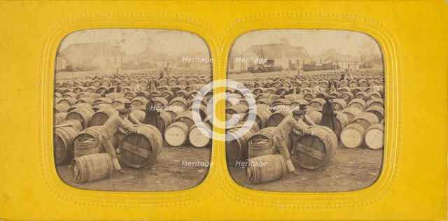 Men rolling a barrel in a field of barrels, 1860s. Creator: E Lamy.