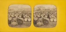 Men rolling a barrel in a field of barrels, 1860s. Creator: E Lamy
