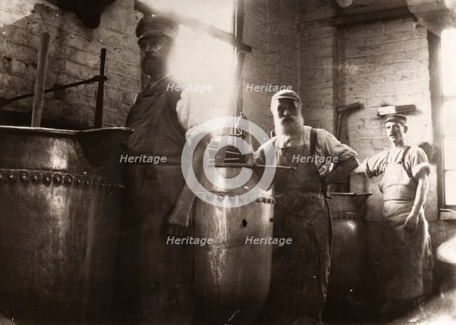 Men standing over boiling vats, Rowntree Cocoa Works, York, Yorkshire, 1900. Artist: Unknown
