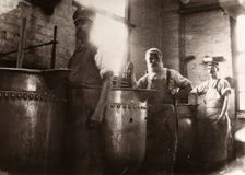 Men standing over boiling vats, Rowntree Cocoa Works, York, Yorkshire, 1900