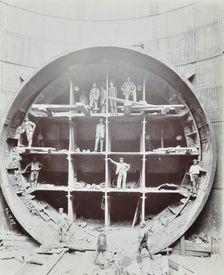 Men standing in the shield used to cut Rotherhithe Tunnel, Bermondsey, London, July 1907