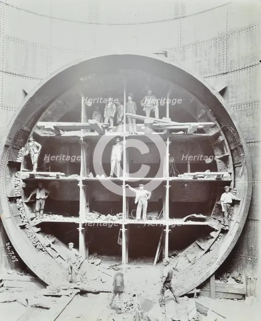 Men standing in the shield used to cut Rotherhithe Tunnel, Bermondsey, London, July 1907. Artist: Unknown.