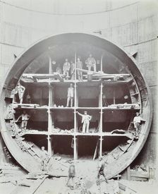 Men standing in the shield used to cut Rotherhithe Tunnel, Bermondsey, London, July 1907