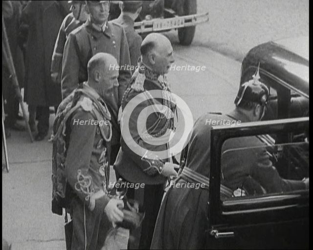 Men Waiting by a Car, 1930s. Creator: British Pathe Ltd.