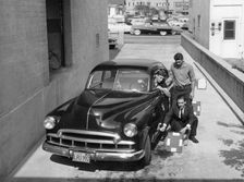 Men with a 1949 customised Chevrolet, (c1949?)