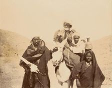 Men with woman riding mule, about 1860-1880. Creator: Unknown